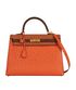 Kelly 35 In Tangerine/Cognac/Etrusque Ostrich, front view
